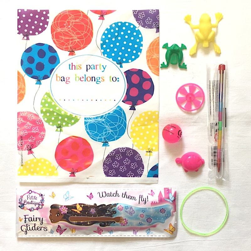 1 Filled Party Bag, 1 Fairy Glider, 1 Stack Crayon Pencil, 1 Lucky Pig, 1 Bouncy Ball, 1 Spinner, 2 Frogs, 1 Bracelet