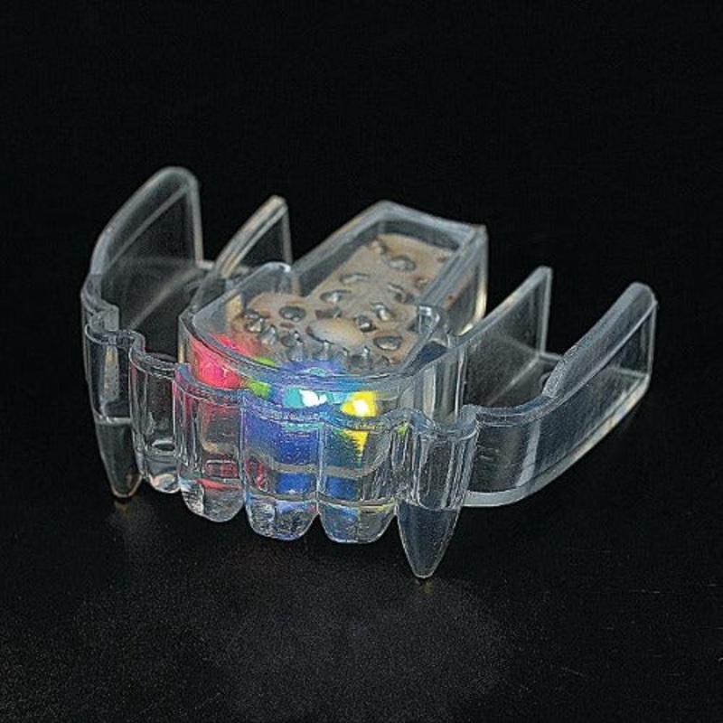 LED Light-Up Flashing Fangs  Pack of 12